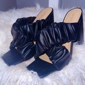 Black chunky mule heels. Never worn. Great condition